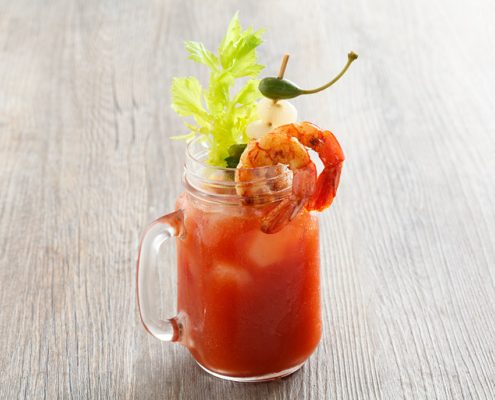 olive oil bloody mary with shrimp celery and pickled vegetables