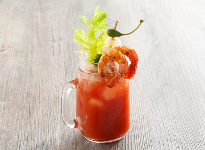 olive oil bloody mary with shrimp celery and pickled vegetables