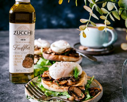 Poached egg with mushrooms english muffin and truffle oil