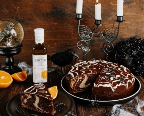 Chocolate Orange Marble Cake with a spider web icing design