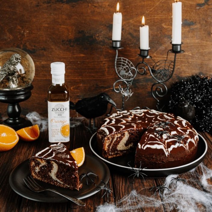 Chocolate Orange Marble Cake with a spider web icing design